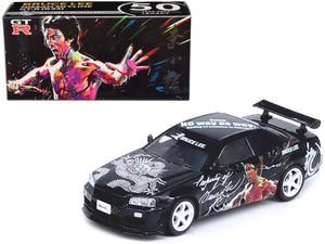 Nissan Skyline GT-R (R34) RHD (Right Hand Drive) Black "Bruce Lee Legacy 50 Year Anniversary" 1/64 Diecast Model Car by Inno Models