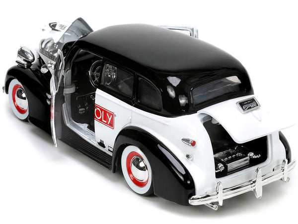 1939 Chevrolet Master Deluxe Black and White "Monopoly" and Mr. Monopoly Diecast Figure "Hollywood Rides" Series 1/24 Diecast Model Car by Jada