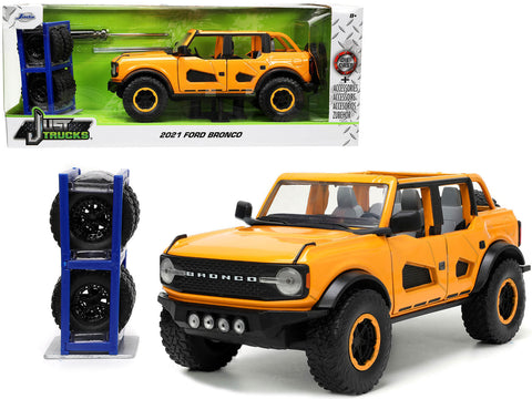 2021 Ford Bronco Orange Metallic with Extra Wheels "Just Trucks" Series 1/24 Diecast Model Car by Jada