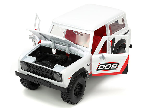 1973 Ford Bronco #008 White with Red and Black Stripes and Red Interior with Extra Wheels "Just Trucks" Series 1/24 Diecast Model Car by Jada