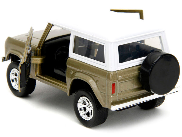 1973 Ford Bronco Gold Metallic with White Top and Groot Diecast Figure "Guardians of the Galaxy" "Marvel" Series 1/32 Diecast Model Car by Jada