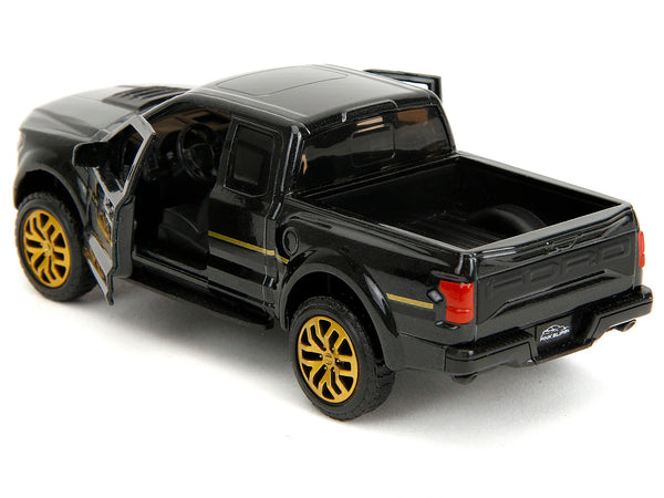 2017 Ford F-150 Raptor Pickup Truck Black Metallic with Gold Stripes "Pink Slips" Series 1/32 Diecast Model Car by Jada