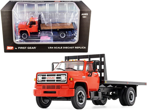 GMC 6500 Flatbed Truck Orange 1/64 Diecast Model by DCP/First Gear