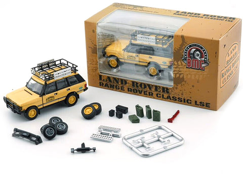 Land Rover Range Rover Classic LSE RHD (Right Hand Drive) "Camel Trophy" Yellow with Roof Rack Extra Wheels and Accessories 1/64 Diecast Model Car by BM Creations