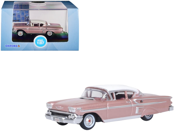 1958 Chevrolet Impala Sport Cay Coral Pink Metallic with White Top 1/87 (HO) Scale Diecast Model Car by Oxford Diecast