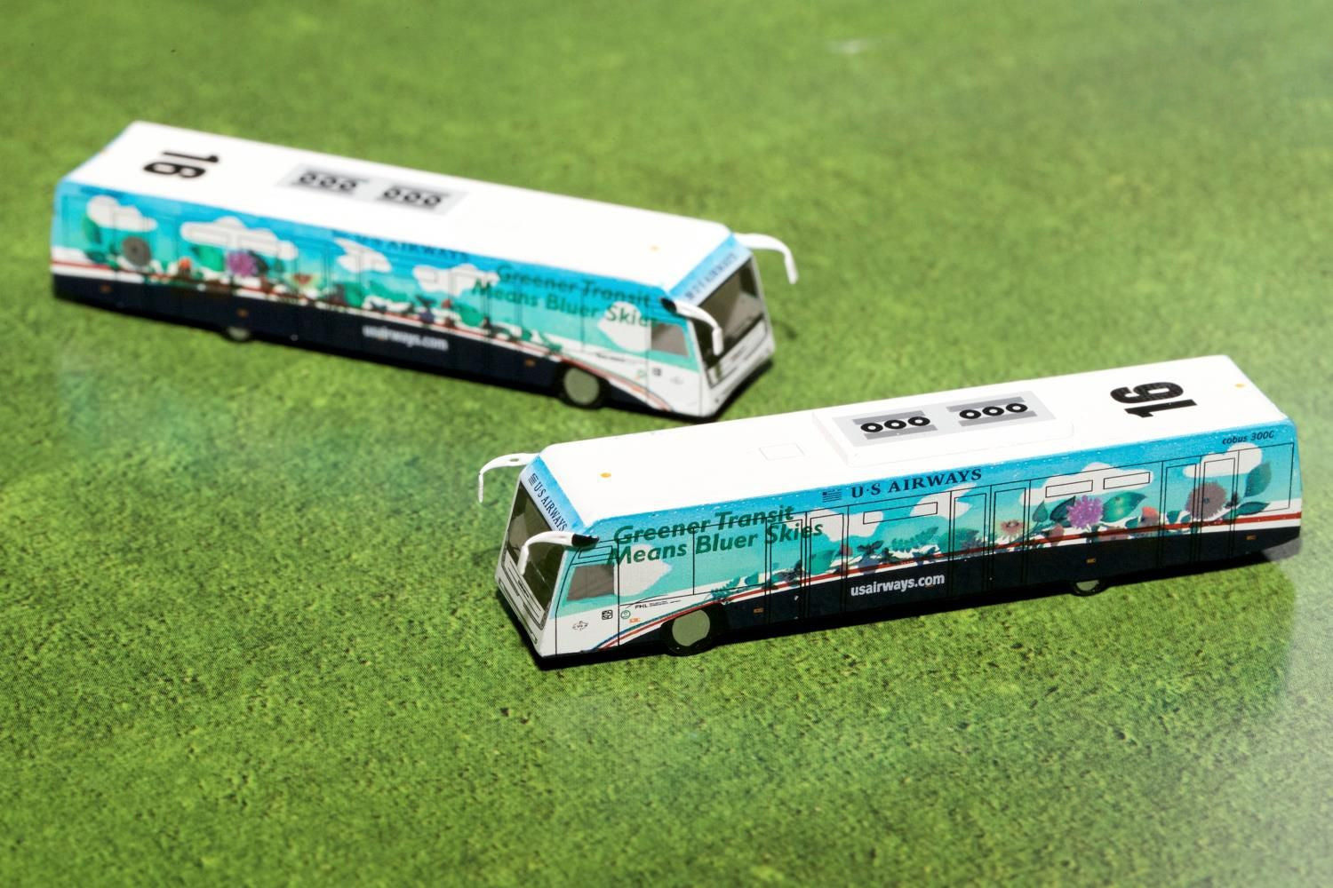 Cobus 3000 Passenger Bus White and Blue with Graphics "US Airways Shuttle Bus - Greener Transit" 2 Piece Set "Gemini 200" Series 1/200 Diecast Models by GeminiJets