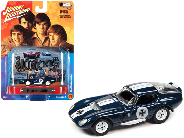 Shelby Cobra Daytona "Klutzmobile" Blue Metallic with White Stripes "The Monkees" with Collectible Tin Display "Silver Screen Machines" Series 1/64 Diecast Model Car by Johnny Lightning